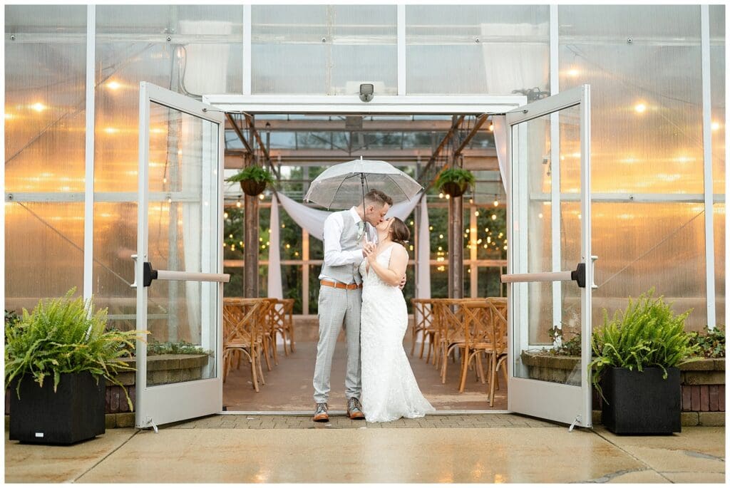 bride and groom, Saugatuck Michigan, spring wedding, tulip bouquet, wedding photos, ivy house venue, green house